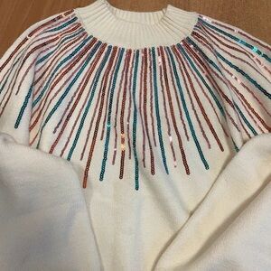 Chic White Sweater with Colorful Sequin Stripes